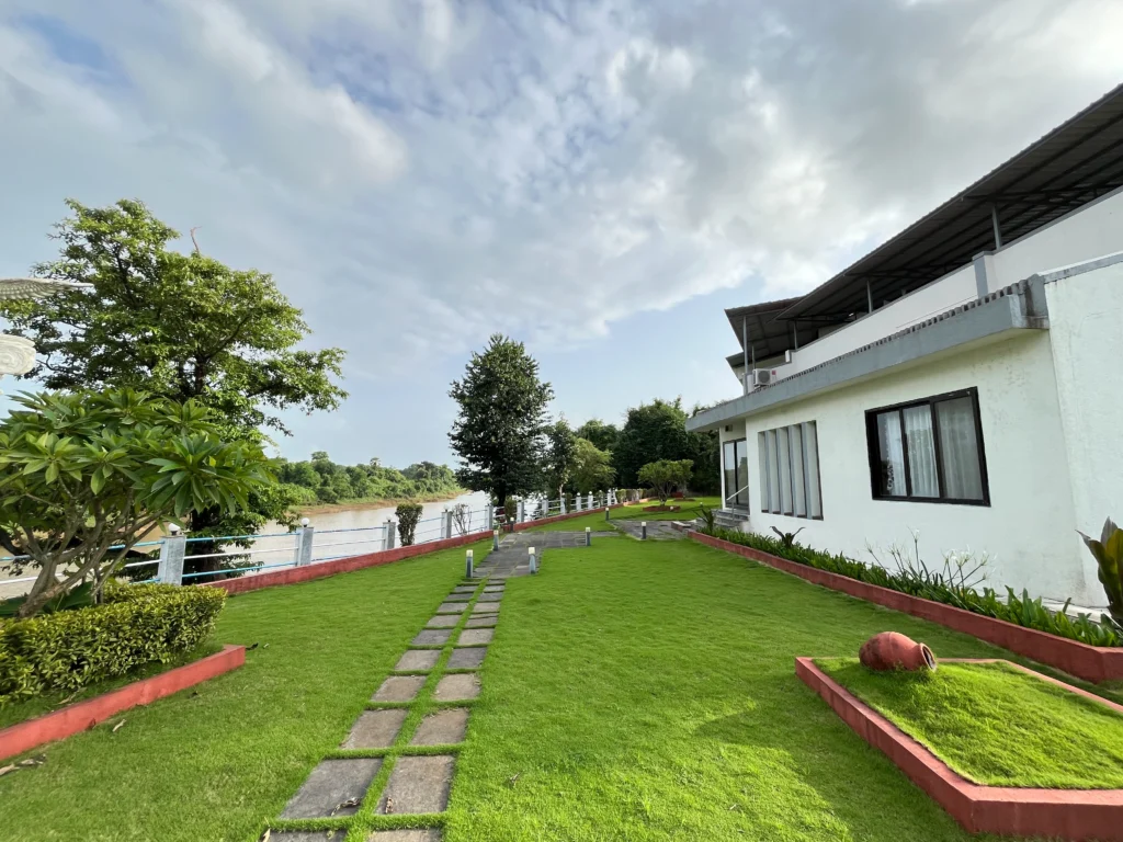 Lush Green Lawn with Villa Exterior